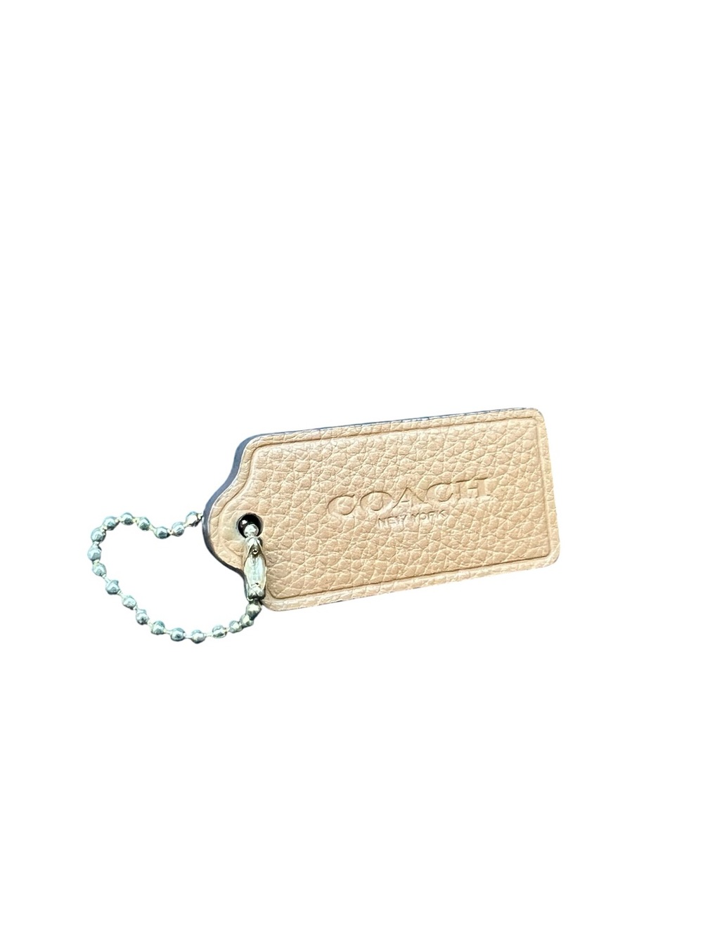 COACH Modern Pebbled Leather Hangtag in Light Beige